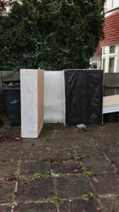 an image of bed bases ready for disposal